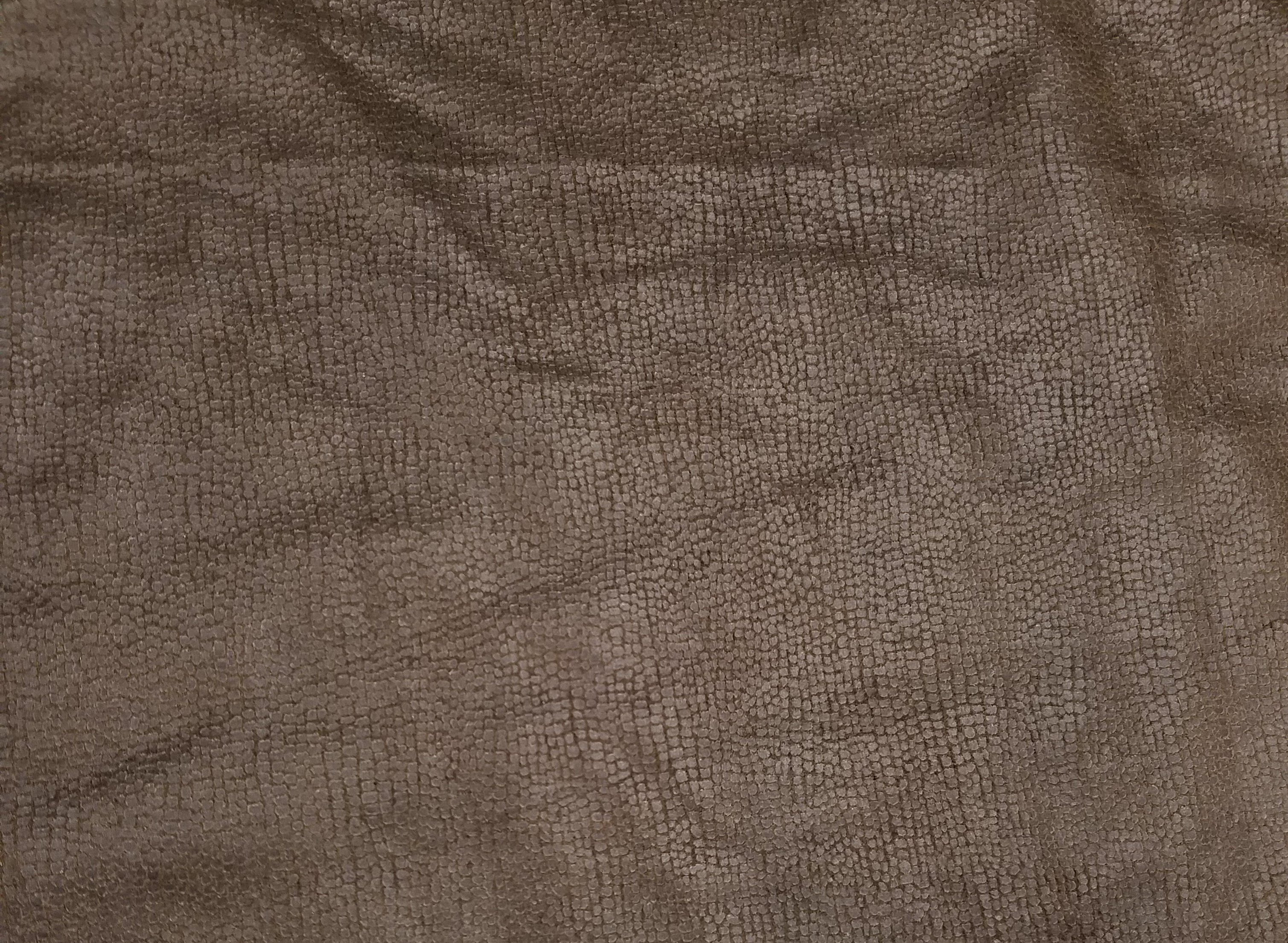 alt: Close-up of the shirt and capelet for the DIY dragon costume.
